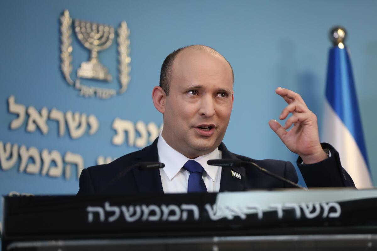Israeli Prime Minister Naftali Bennett speaks during a news conference