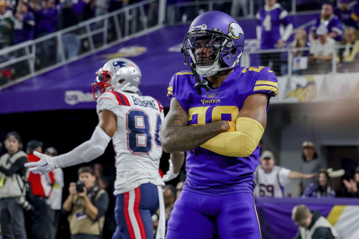 Minnesota Vikings' Duke Shelley reacts after breaking up a play to New England Patriots' Kendrick Bourne.