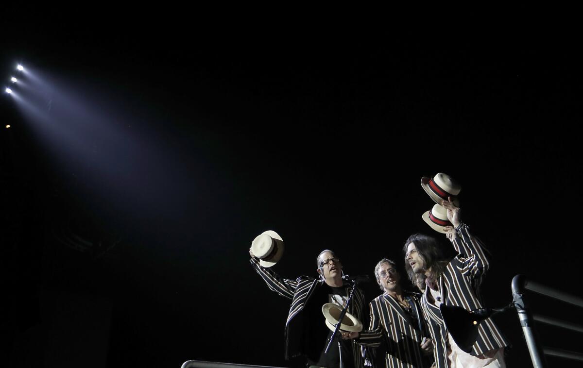 Weezer opened the show with a barbershop-quartet rendition of "Beverly Hills."