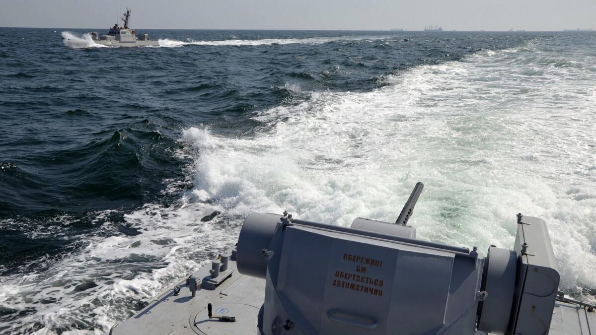Two Ukrainian navy ships are seen near Crimea on Nov. 25.