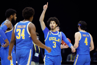 INDIANAPOLIS, INDIANA - APRIL 03: Johnny Juzang #3 of the UCLA Bruins reacts in the second half against the Gonzaga Bulldogs.