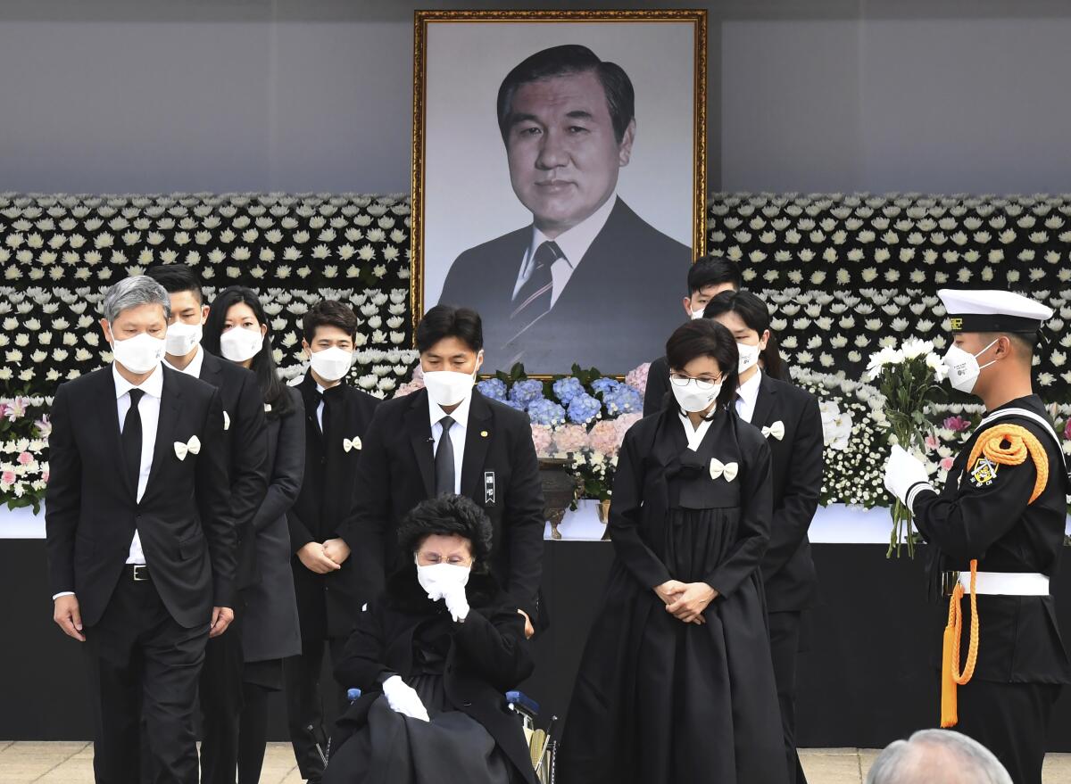 Relatives in black attend the funeral of former South Korean President Roh Tae-woo
