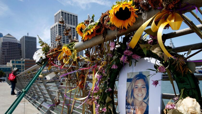 Ahoto, flowers and a portrait of Kate Steinle at a memorial site on Pier 14 in San Francisco on July 17, 2015.