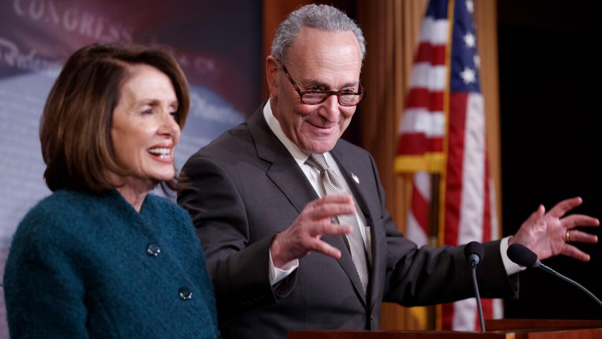 Senate Minority Leader Charles E. Schumer (D-N.Y.), with House Minority Leader Nancy Pelosi (D-San Francisco), during a news conference at the Capitol in on Thursday.