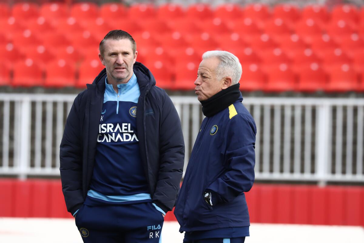 Former Galaxy coach Robbie Keane, left, and former U.S. men's national soccer team assistant Dave Sarachan.