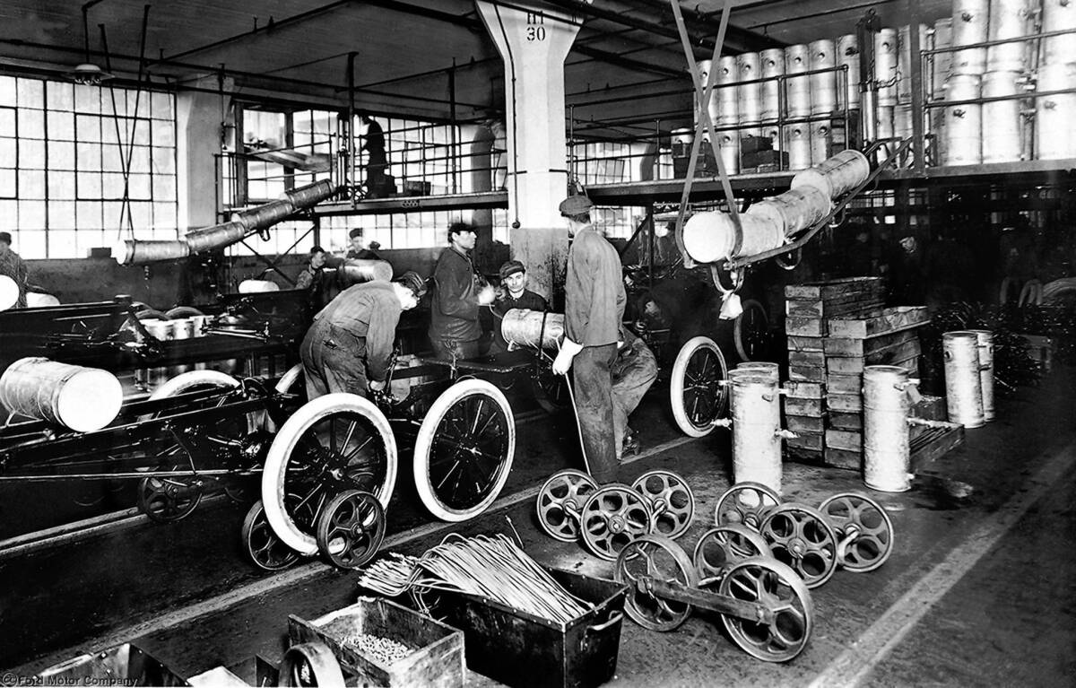 In 1914, Henry Ford more than doubled factory workers' minimum pay to $5 a day so they could afford to buy Ford cars. Above is the Highland Park plant in 1913.
