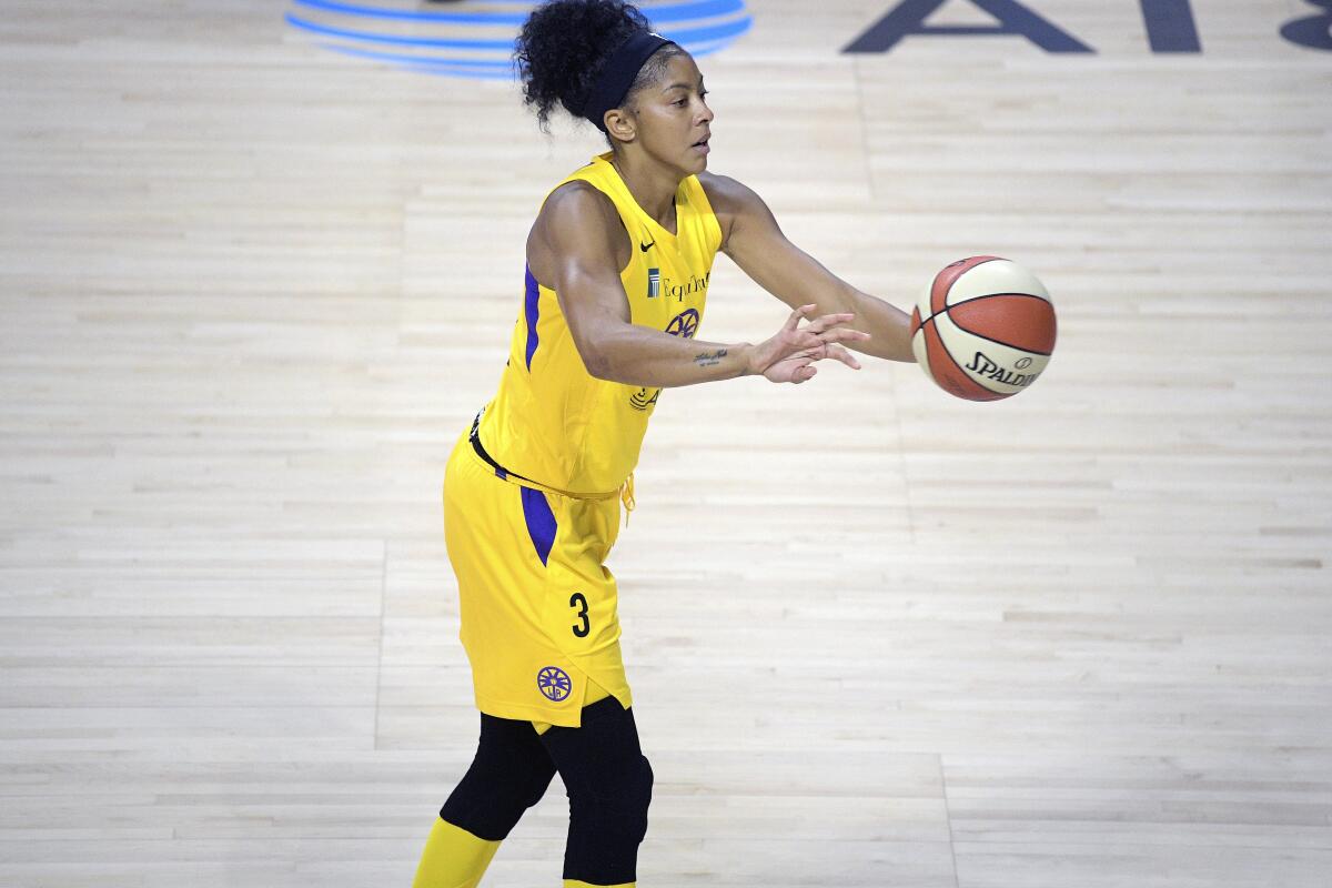 Sparks forward Candace Parker passes the ball against the Mercury on July 25, 2020, in Bradenton, Fla.