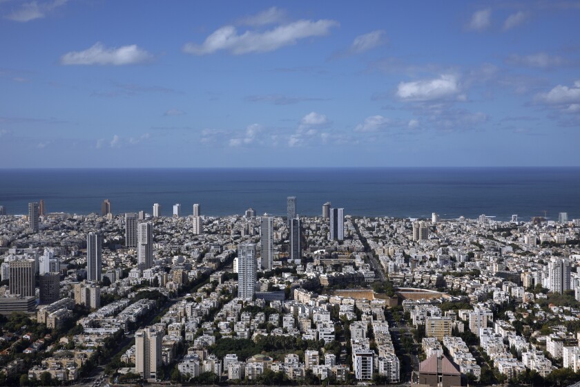 A general view shows the center of Tel Aviv, Israel, Thursday, Dec. 2, 2021. Residents of Israel's seaside metropolis Tel Aviv have for years complained of how expensive it is, with living costs taking a chunk out of their paychecks. A report released Wednesday, Dec. 1, 2021, by the Economist Intelligence Unit, a research group linked to the Economist magazine, said Tel Aviv has emerged as the most expensive city to live in. (AP Photo/Oded Balilty)