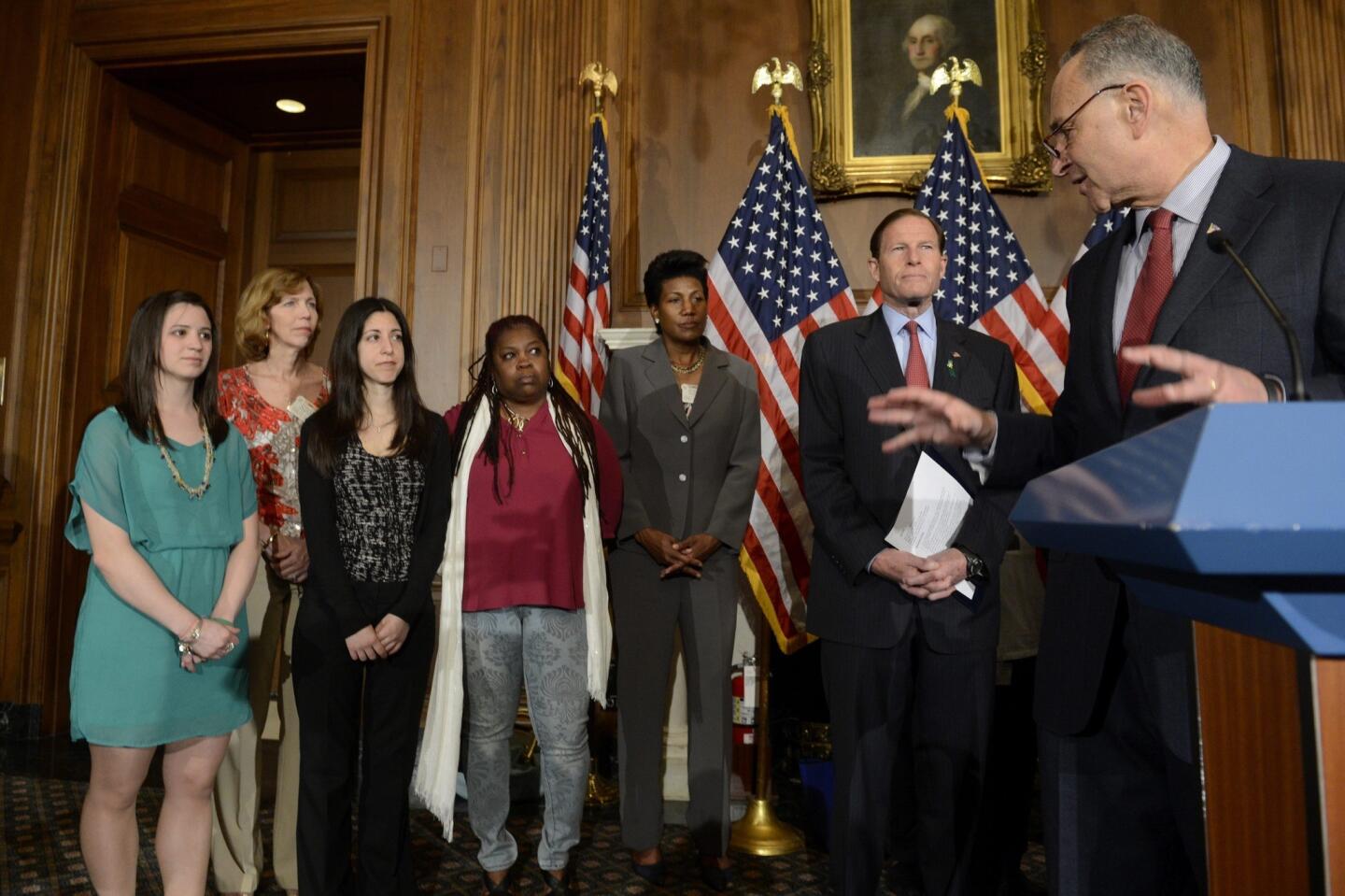 Schumer with gun violence victims