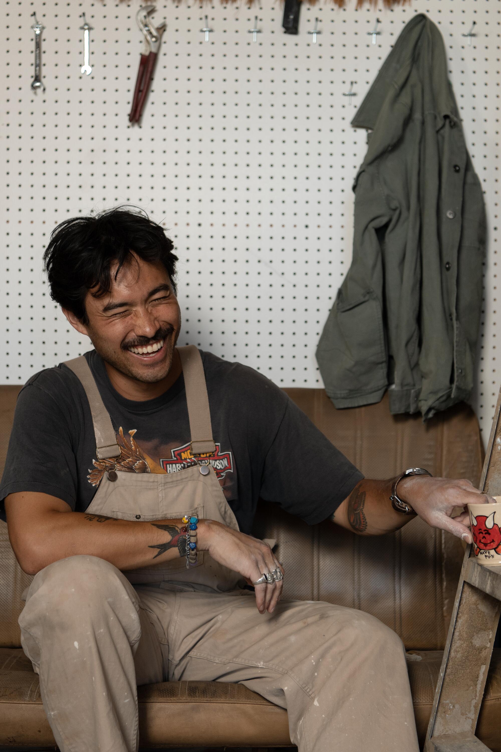 Portrait of Daniel Dooreck inside his ceramics studio 