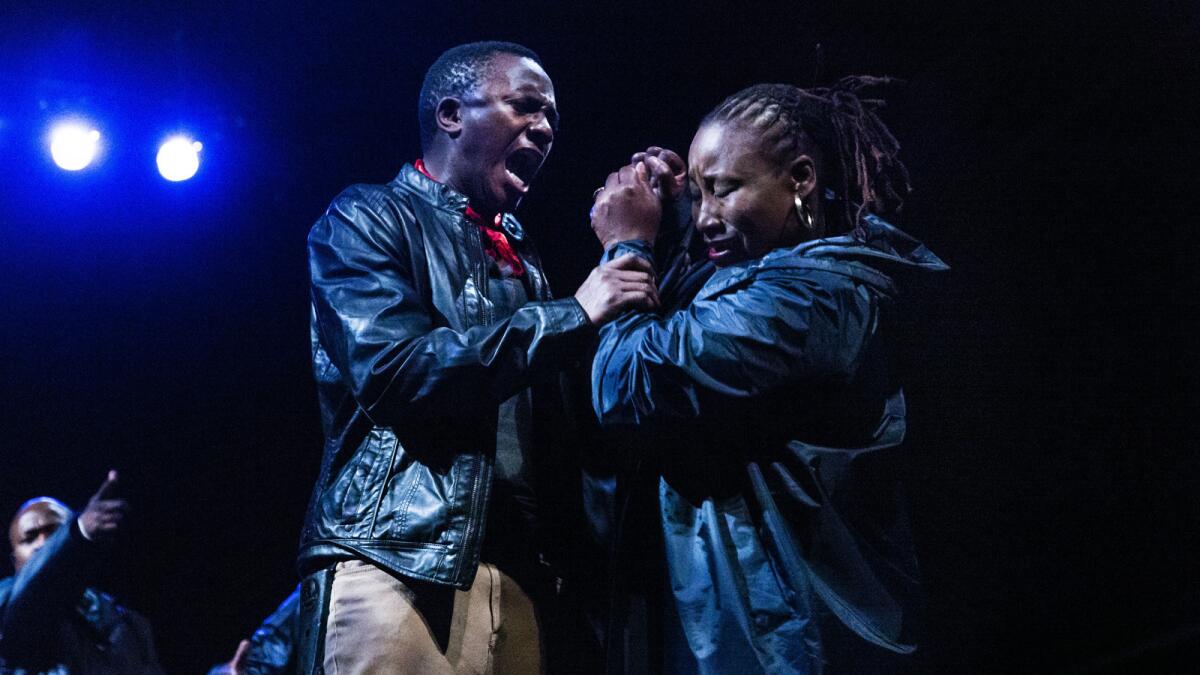 Mhlekazi Wha Wha Mosiea and Pauline Malefane in a dress rehearsal scene of "Carmen."