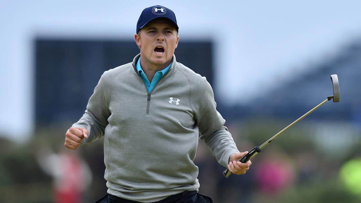 Jordan Spieth celebrates after sinking a birdie on the 16th hole during the final round of the British Open at St. Andrews, Scotland, on Monday.