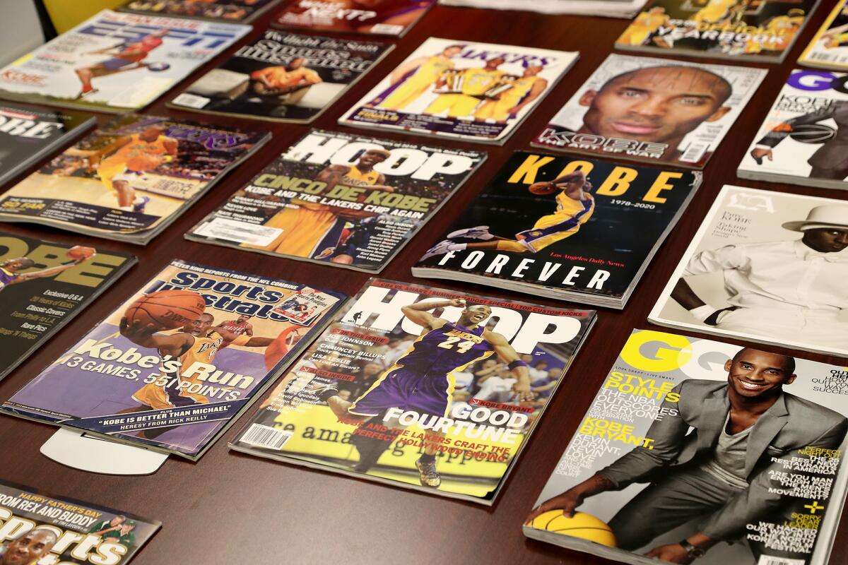 Various magazines with Los Angeles Lakers legend Kobe Bryant on the conference room table at Renovo Solutions in Irvine.
