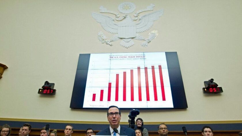 Treasury Secretary Steven Mnuchin testifies before the House Financial Services Committee on Capitol Hill.