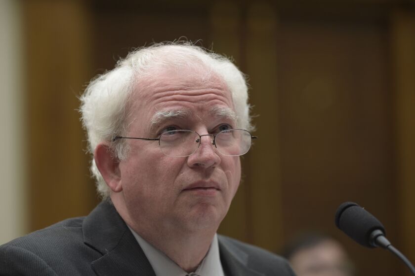 FILE - Chapman School of Law professor John Eastman testifies on Capitol Hill in Washington, March 16, 2017. Conservative attorney Eastman, a lead architect of some of former President Donald Trump's efforts to remain in power after the 2020 election, was slapped Thursday, Jan.26, 2023, with a series of disciplinary charges in California that could lead to his disbarment. (AP Photo/Susan Walsh, File)