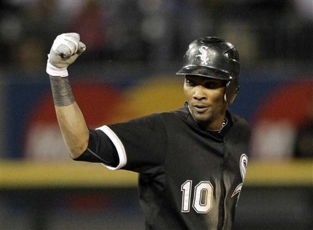 Chicago White Sox's Paul Konerko pumps his fist after hitting a