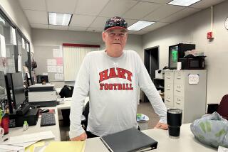 Hart football coach Rick Herrington is back coaching after heart transplant surgery in April.