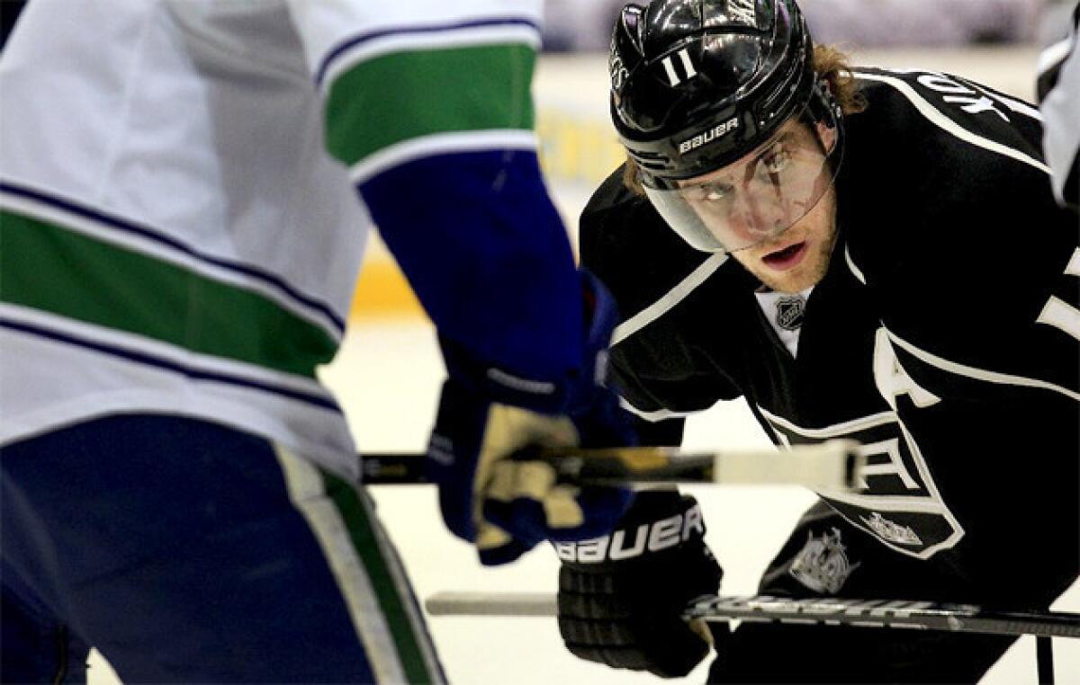 Kings' Anze Kopitar waits for the puck to drop as Los Angeles takes on the Vancouver Canucks.