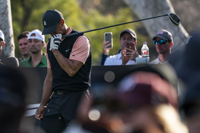 PACIFIC PALISADES, CA - FEBRUARY 13, 2020: Tiger Woods reacts after hitting his tee shot into a fairway bunker on hole 17 during Round 1 of the Genesis Open at Riviera Country Club on February 13, 2020 in Pacific Palisades, California. He shot a 69. (Gina Ferazzi/Los AngelesTimes)
