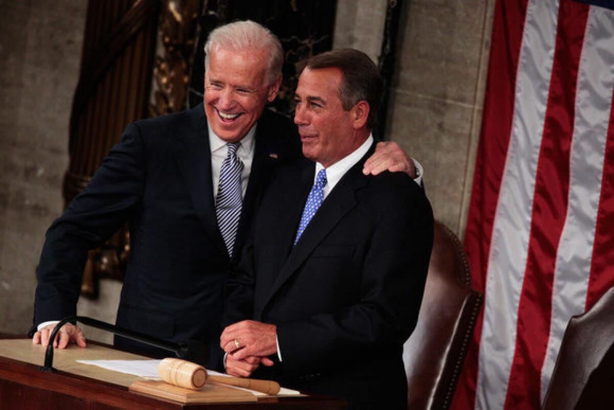 Vice President Joe Biden Speaker of the House John Boehner stand at President Obama's State of the Union speech on Jan. 24, 2012.