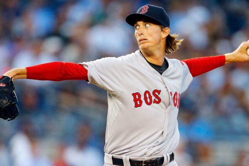 NEW YORK, NY - AUGUST 04: Henry Owens #60 of the Boston Red Sox delivers a pitch in the second inning of his major league debut against the New York Yankees at Yankee Stadium on August 4, 2015 in the Bronx borough of New York City. (Photo by Jim McIsaac/Getty Images) ** OUTS - ELSENT, FPG - OUTS * NM, PH, VA if sourced by CT, LA or MoD **