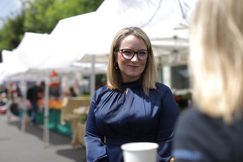 LOS ANGELES, CA - APRIL 10: Lindsey Horvath is running for supervisor in Los Angeles County's District 3. Melrose Place Farmers Market on Sunday, April 10, 2022 in Los Angeles, CA. (Myung J. Chun / Los Angeles Times)