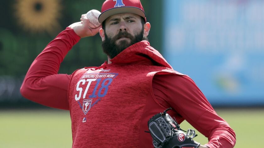 Phillies pitcher Jake Arrieta throws during a work out before a spring baseball exhibition game against the Tampa Bay Rays, Tuesday, March 13, 2018, in Clearwater, Fla.