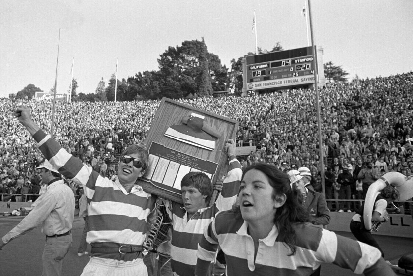 1982 photo of the Stanford band on the field at the end of the California-Stanford NCAA college football game in Berkeley