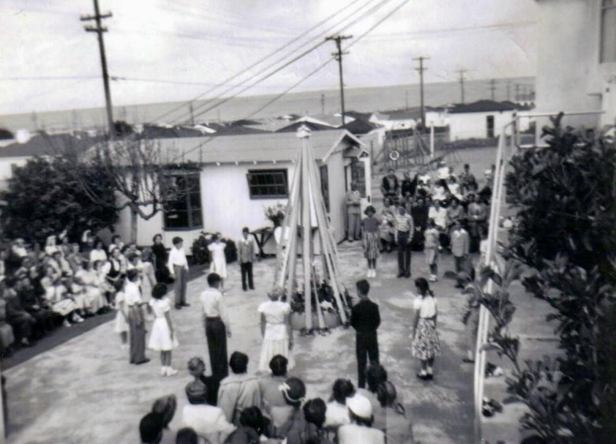 One of the traditions still celebrated at Warren-Walker School is the annual Maypole dance.