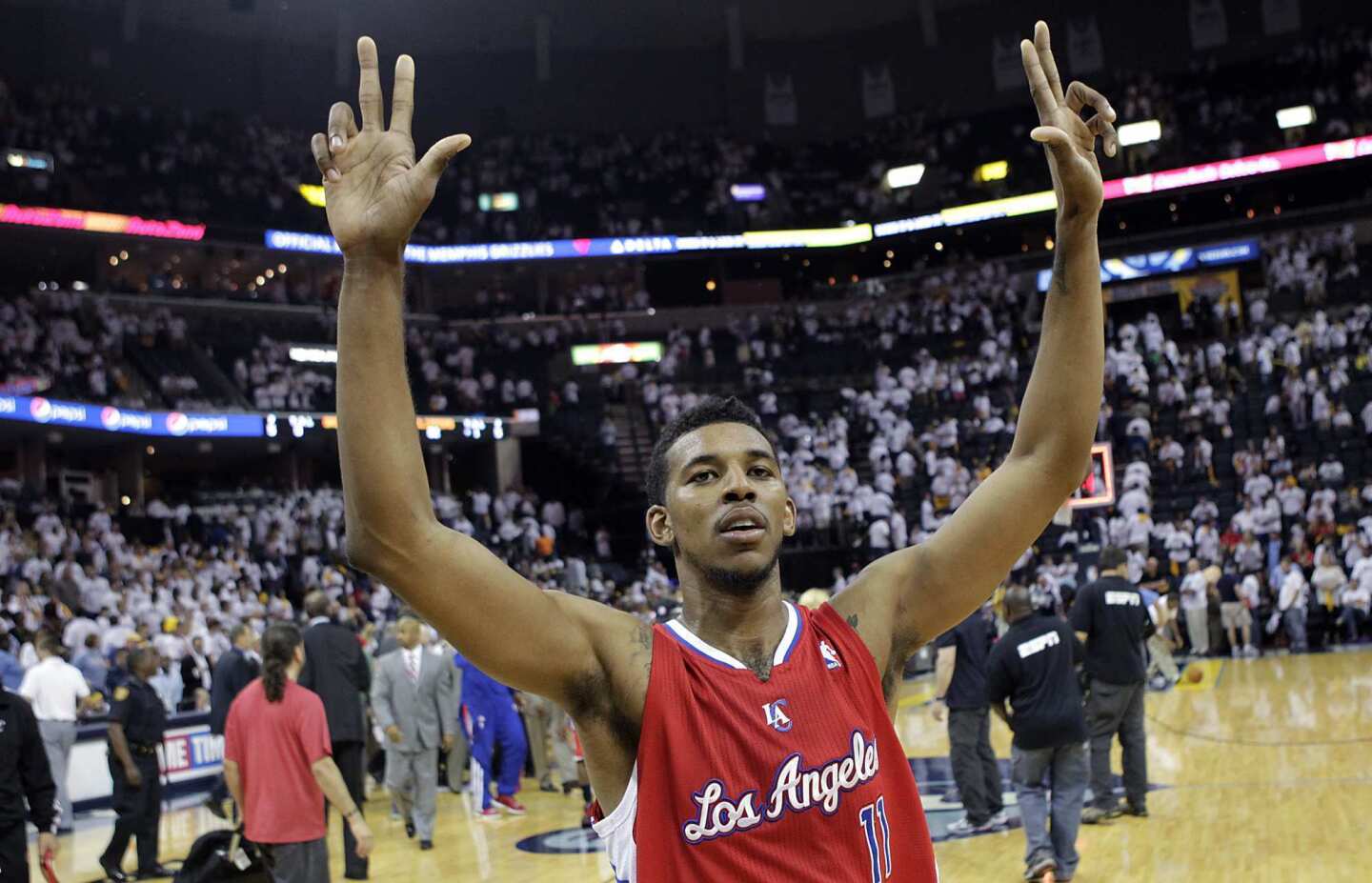 Guard Nick Young celebrates after the Clippers upset the Grizzlies, 82-72, in Game 7 of their first-round playoff series on Sunday afternoon in Memphis.