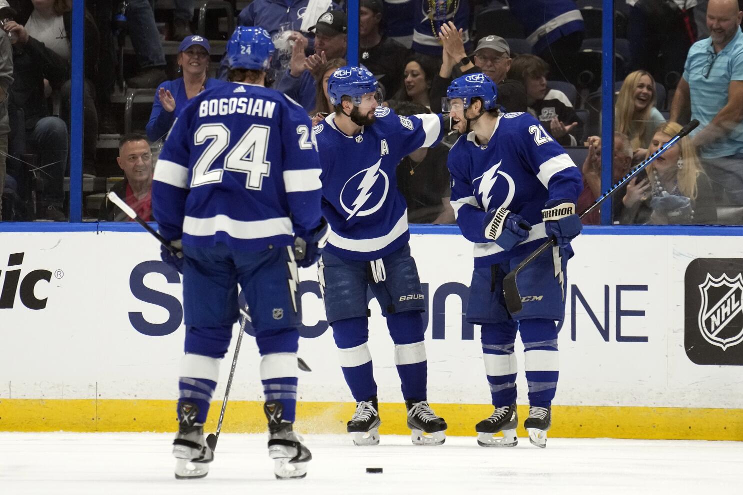 Tampa Bay Lightning center Brayden Point celebrates with teammate