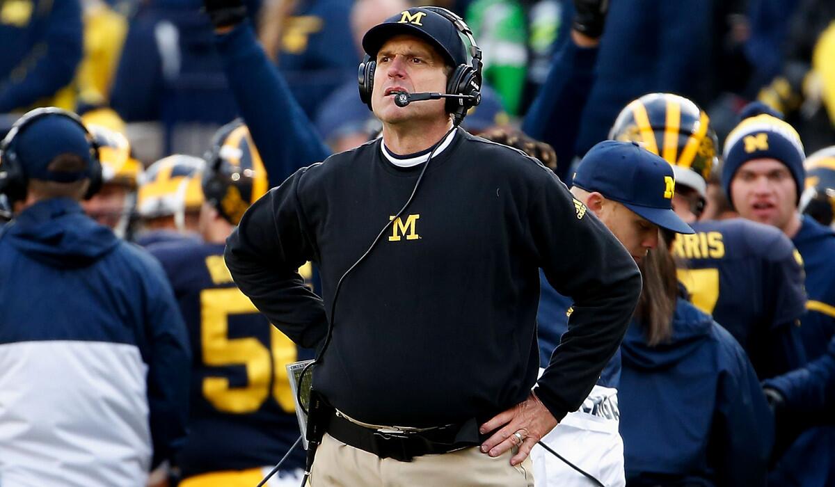 Michigan Head coach Jim Harbaugh reacts on the sidlines during the second quarter of a game against Michigan State on Saturday.
