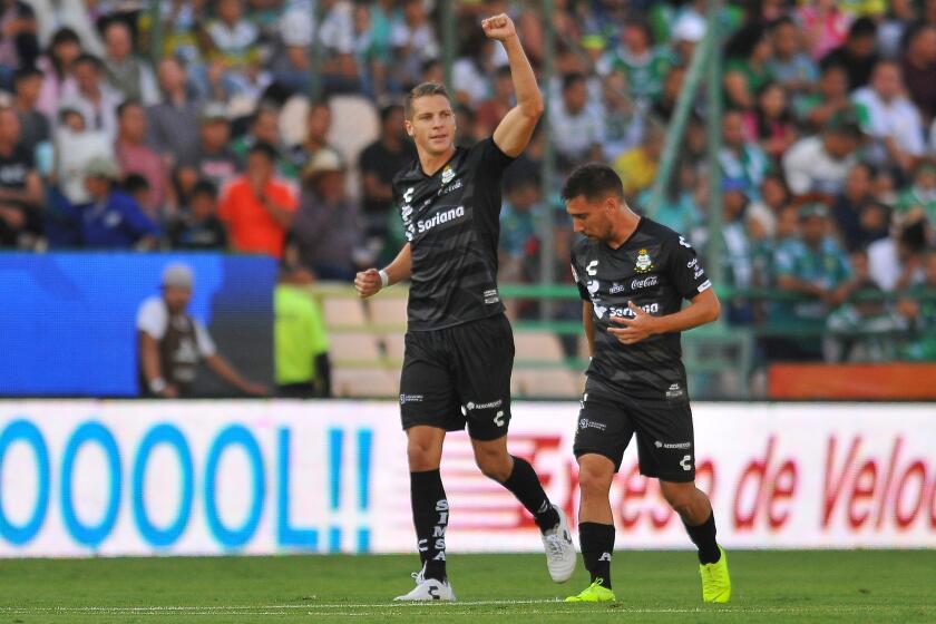Julio Furch (L) of Santos celebrates his goal against Leon during the Mexican Apertura 2019 tournament football match at Nou Camp stadium in Leon, Guanajuato state, Mexico on August 28, 2019. (Photo by VICTOR CRUZ / AFP)VICTOR CRUZ/AFP/Getty Images ** OUTS - ELSENT, FPG, CM - OUTS * NM, PH, VA if sourced by CT, LA or MoD **