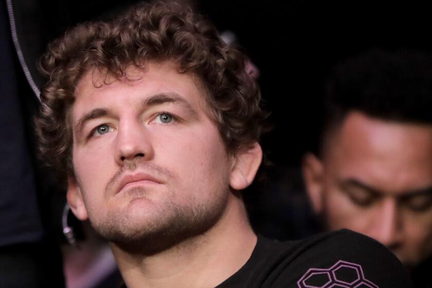 UFC fighter Ben Askren waits for the start of a middleweight mixed martial arts bout between David Branch and Jared Cannonier at UFC 230, Saturday, Nov. 3, 2018, at Madison Square Garden in New York. (AP Photo/Julio Cortez)