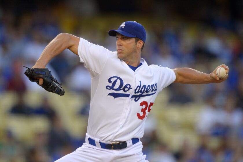 Dodgers pitcher Chris Capuano is still hampered by a groin injury suffered last week.