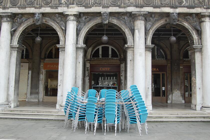 Cafes in Venice's Piazza San Marco remained closed on Monday even though they were allowed to reopen following the easing of coronavirus restrictions.