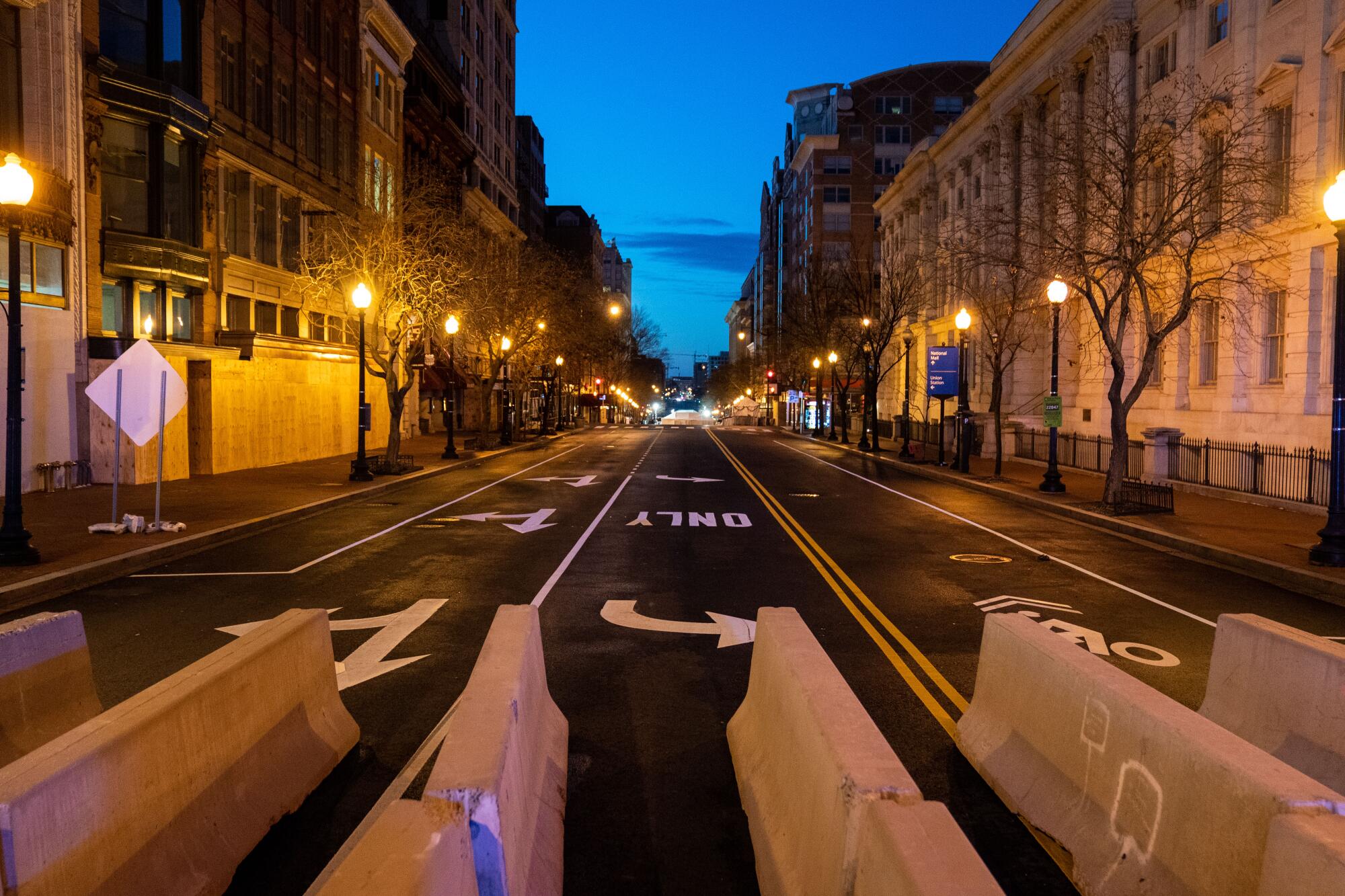  Barricades are placed on a street in downtown Washington DC.