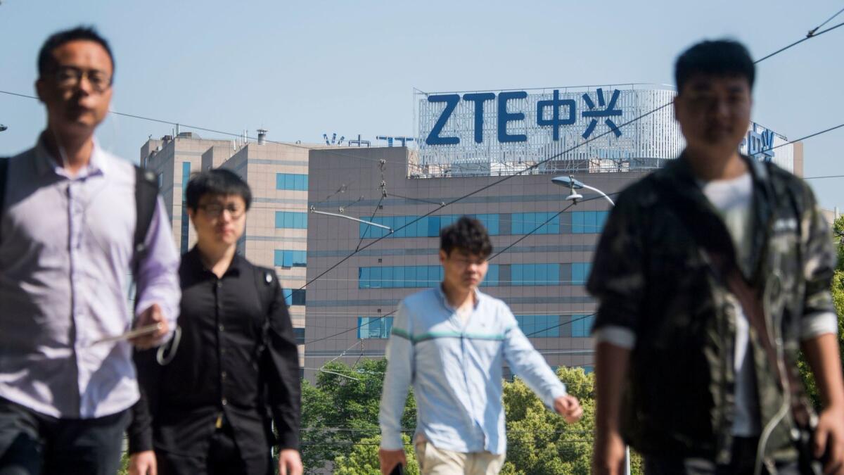 The ZTE logo is seen on an office building in Shanghai on May 3, 2018.