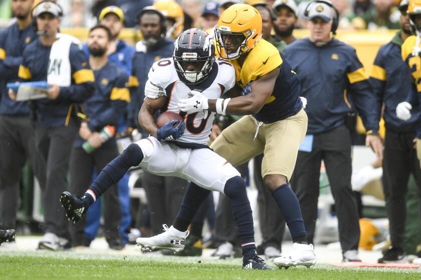 GREEN BAY, WI - SEPTEMBER 22: Adrian Amos (31) of the Green Bay Packers tackles Emmanuel Sanders (10) of the Denver Broncos during the first half on Sunday, September 22, 2019. (Photo by AAron Ontiveroz/MediaNews Group/The Denver Post via Getty Images)