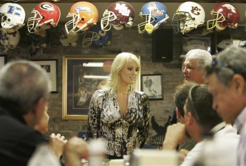 Stormy Daniels visits a local restaurant in downtown New Orleans, Wednesday, May 6, 2009. Daniels, an adult film star, is exploring the possibility of challenging incumbent Louisiana U.S. Sen. David Vitter when Vitter stands for re-election. (AP Photo/Bill Haber)