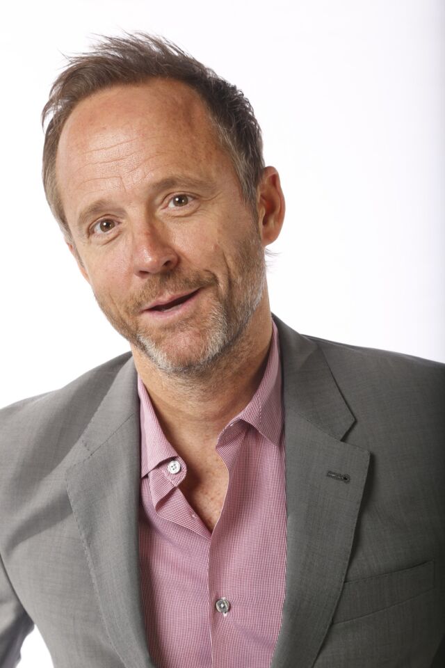 John Benjamin Hickey, nominated for outstanding supporting actor in a miniseries or movie, at the L.A. Times photo booth at the 65th Annual Primetime Emmy Awards actors dinner on Friday.