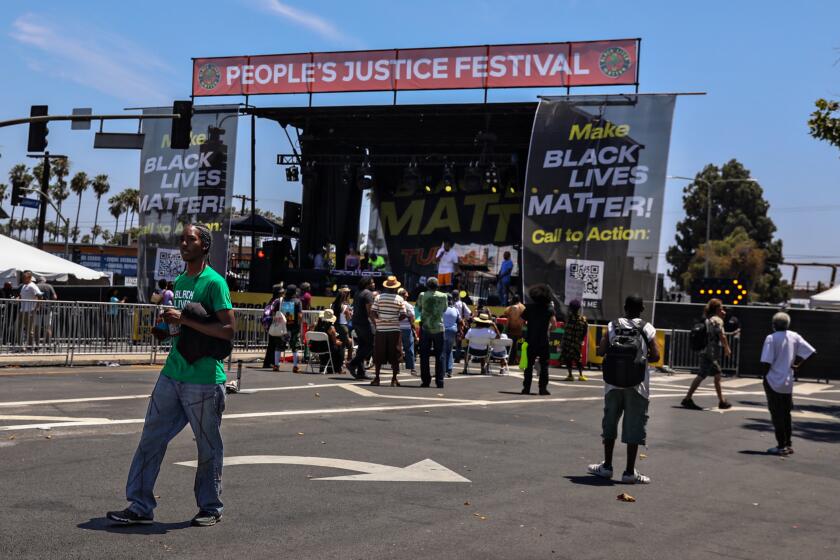 Los Angeles, CA - July 15: A sparse crowd gathers at the 10th anniversary Black Lives Matter Festival in Leimert Park on Saturday, July 15, 2023 in Los Angeles, CA. (Jason Armond / Los Angeles Times)