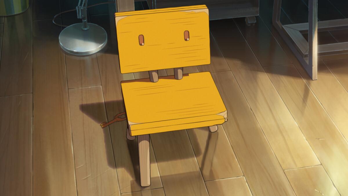 a small yellow chair with only 3 legs
