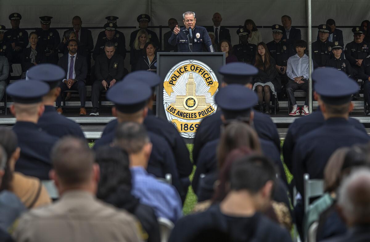 LAPD Chief Michel Moore addresses Police Academy graduates.