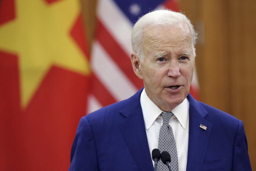 FILE - US President Joe Biden addresses the media during a press briefing at the headquarter of CPV Central Committee in Hanoi, Vietnam, on Sept.10, 2023. Police in Vietnam announced Thursday May 9, 2024 that they have arrested a senior official of the country’s labor ministry for "deliberately disclosing state secrets.” The arrest alarms human rights and labor activists who believe it is a sign of continuing repression, which has previously been directed especially at bloggers and civil society groups. As such, it could also could hurt Vietnam’s efforts to obtain more favorable trade terms for its exports to the United States, which are currently being reviewed in Washington. (Luong Thai Linh/Pool Photo via AP, File)