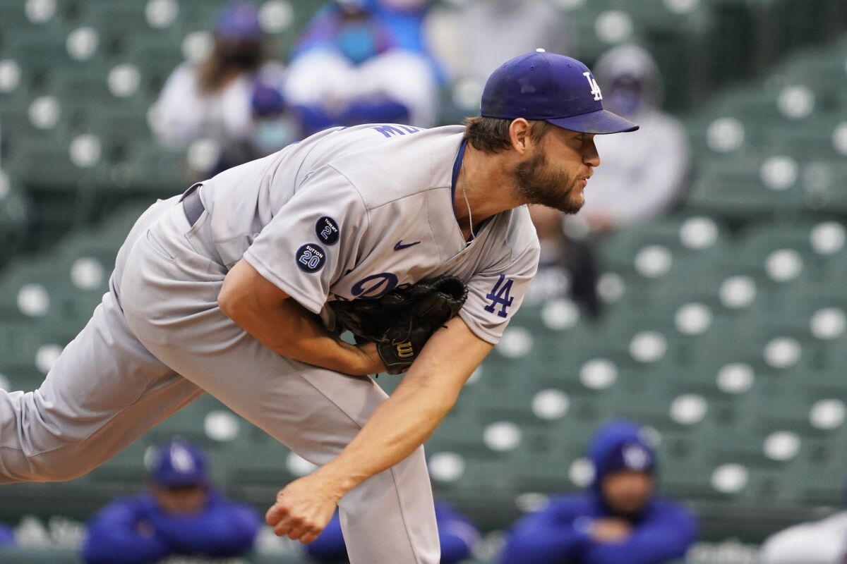 Los Angeles Dodgers starting pitcher Clayton Kershaw throws the ball against the Chicago Cubs.