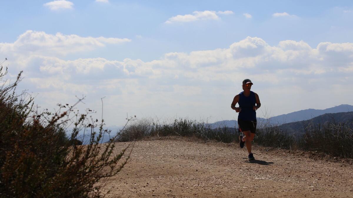 A runner enjoys the Descanso Trail.