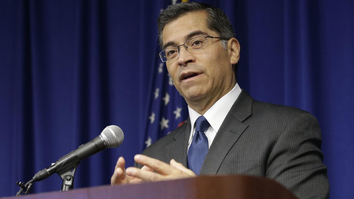 California Atty. Gen. Xavier Becerra announced criminal charges against a man who allegedly defrauded immigrants who were in the country illegally.