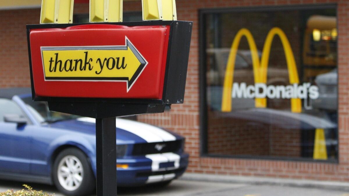 A McDonald's executive has floated the idea of using license plate recognition to personalize smart menus. The chain recently bought a machine-learning start-up.
