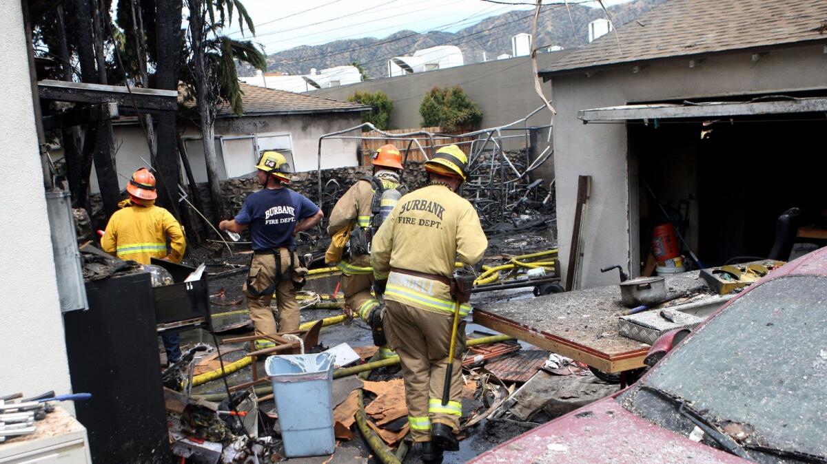 Burbank Fire Department personnel extinguished a fire at a home in the 800 block of North Mariposa St. in Burbank on Thursday, April 27, 2017.